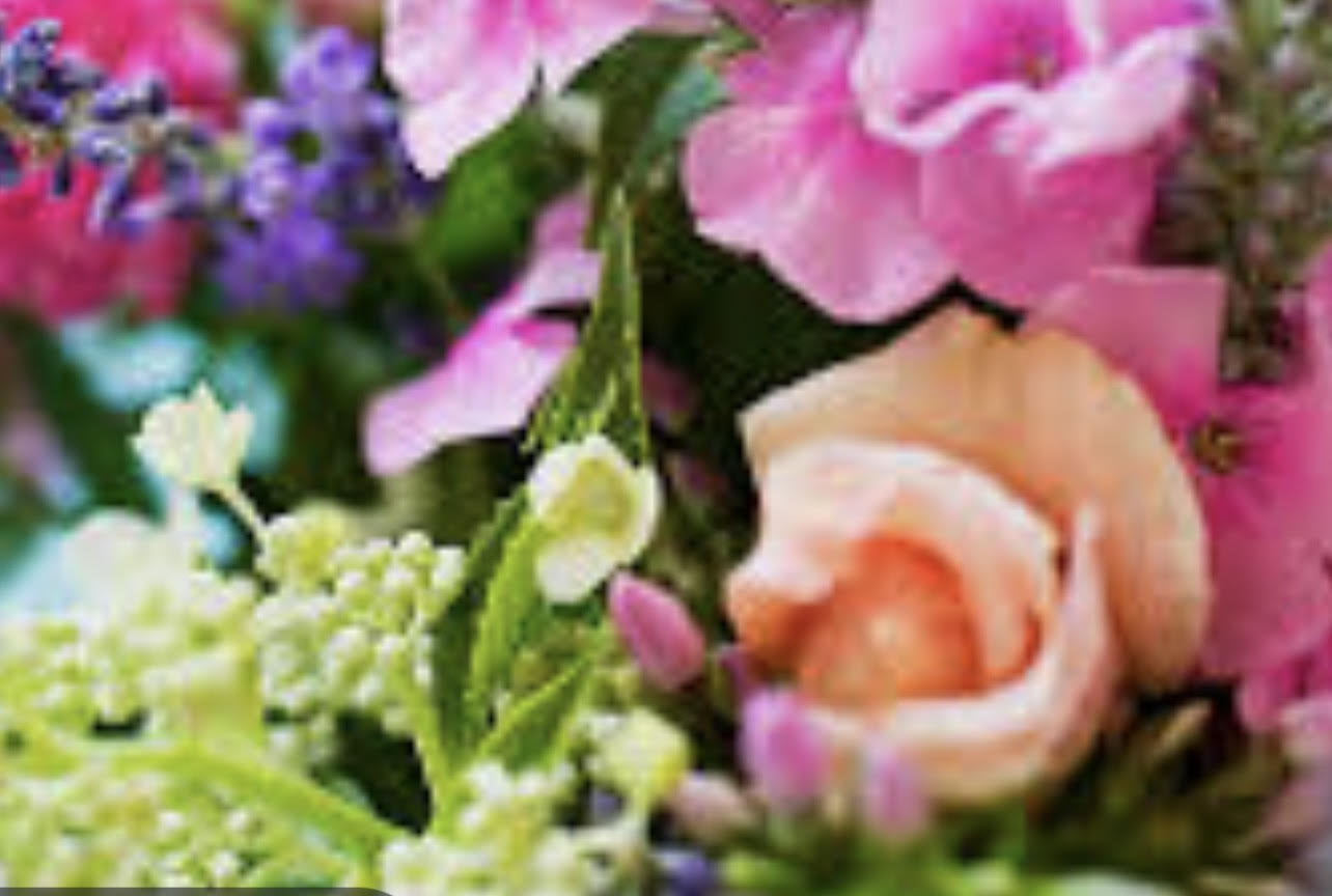 Deluxe Florist's Choice Seasonal Arrangement